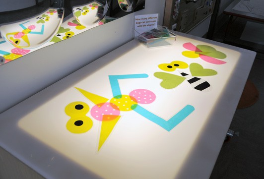 geometric shapes activity on a light table