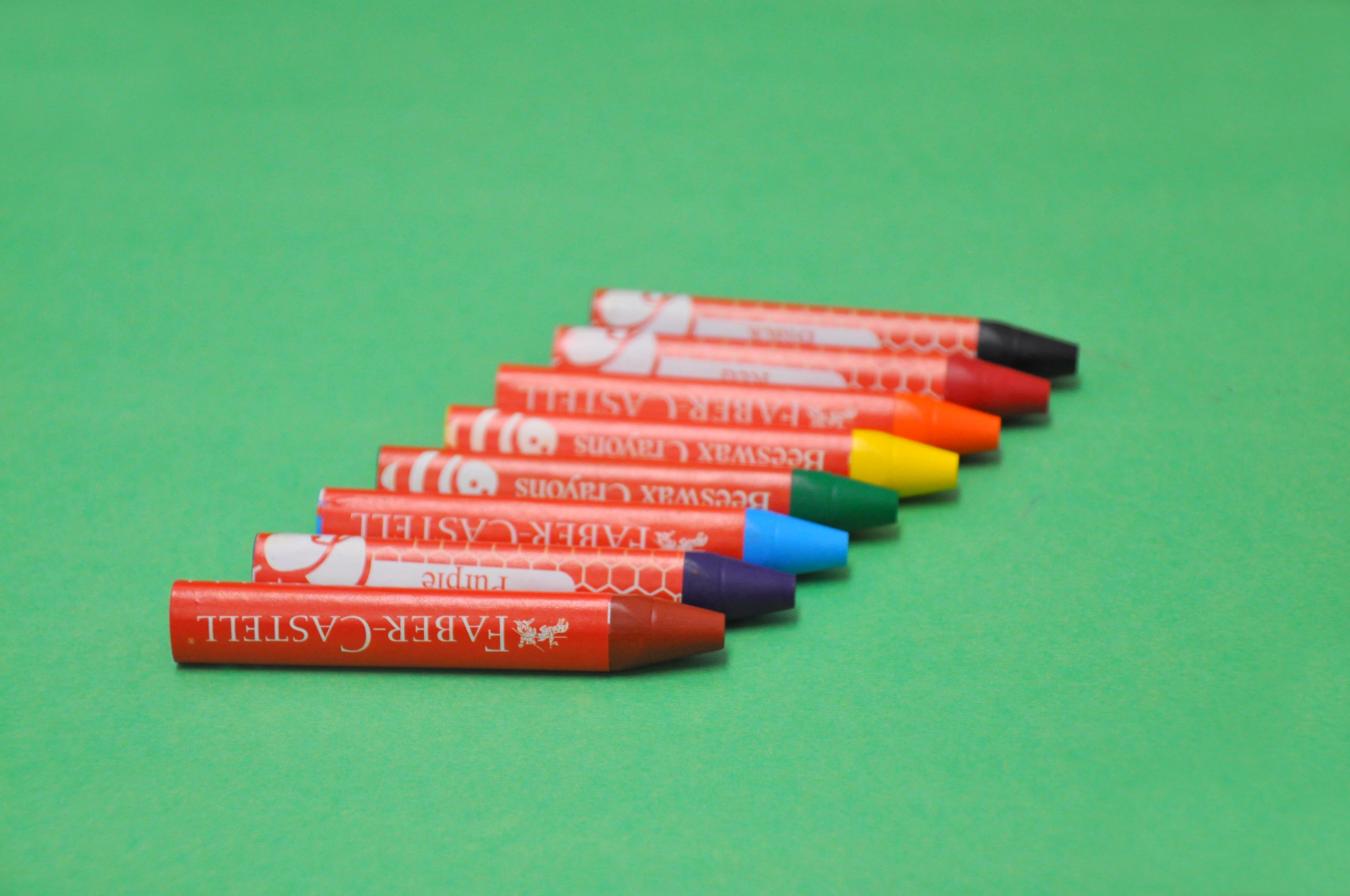 A colorful line-up of beeswax crayons.