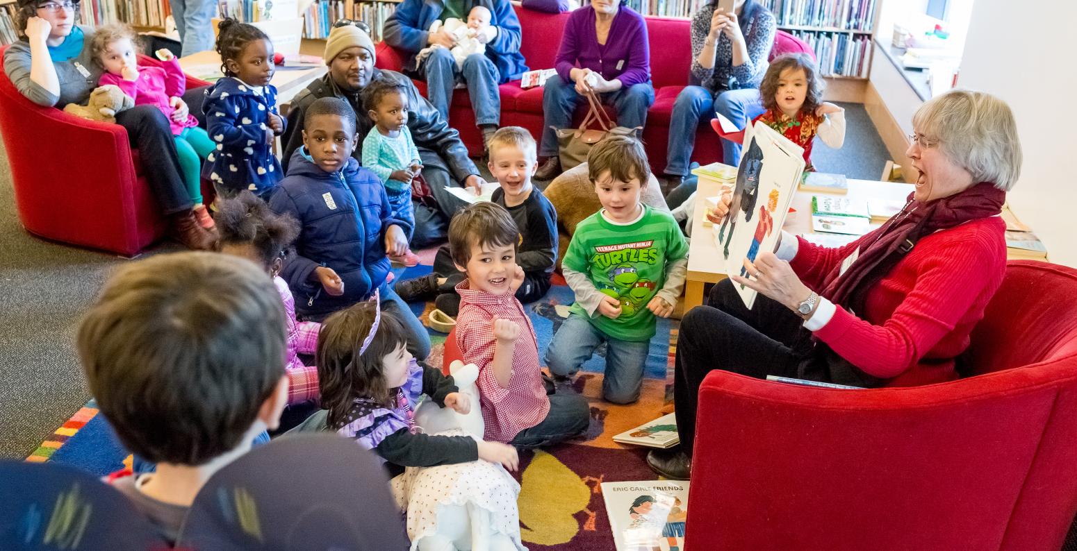 Families sitting together for a storytime