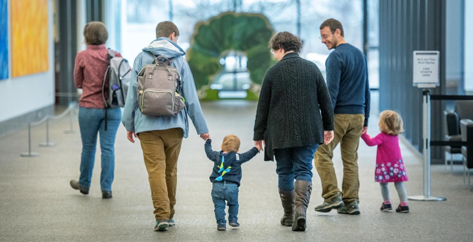 Family walking in Great Hall