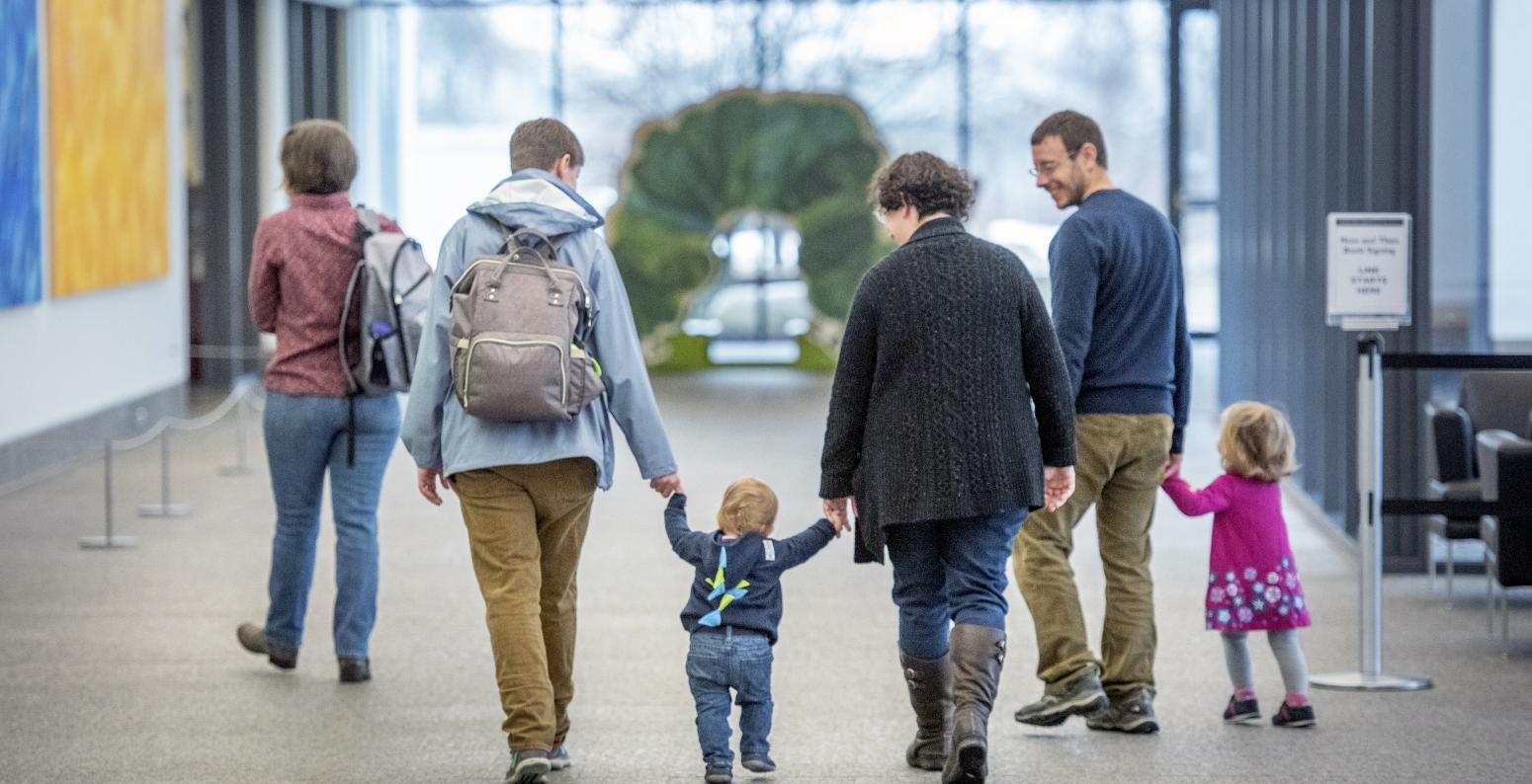 Family walking in Great Hall