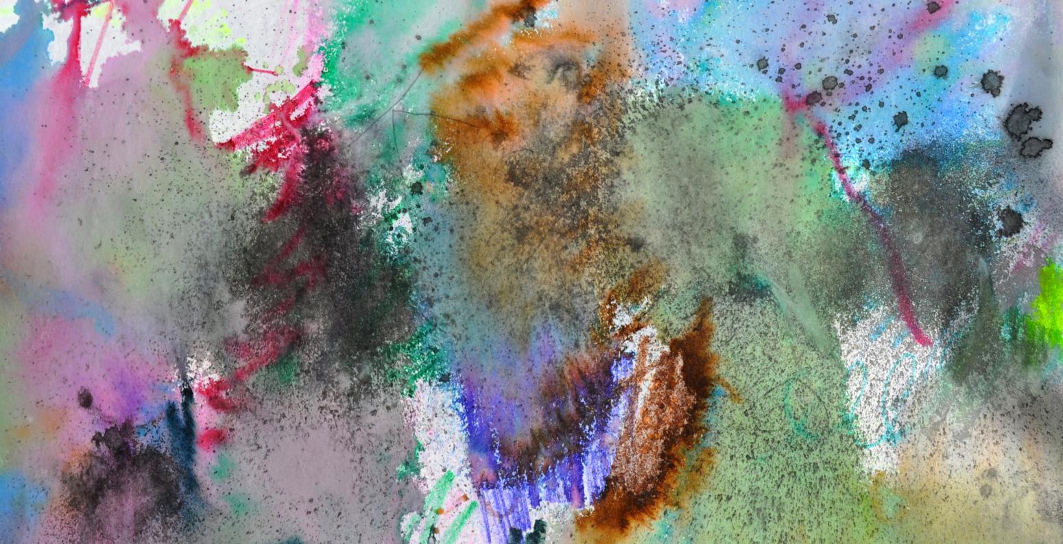 A watercolor painting with splashes of colors across it.