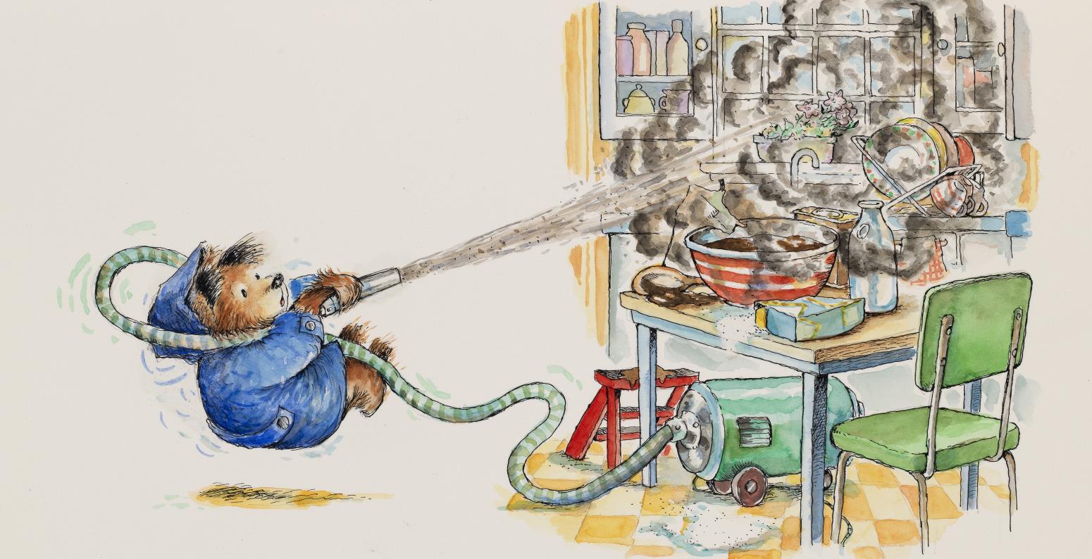 Paddington bear using a vacuum cleaner to try to put out a kitchen fire.