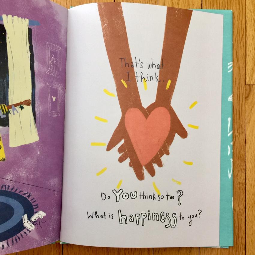 Illustration from Layla's Happiness shows two hands holding a pink heart with the text "That's what I think. Do You think so too? What is happiness to you?"