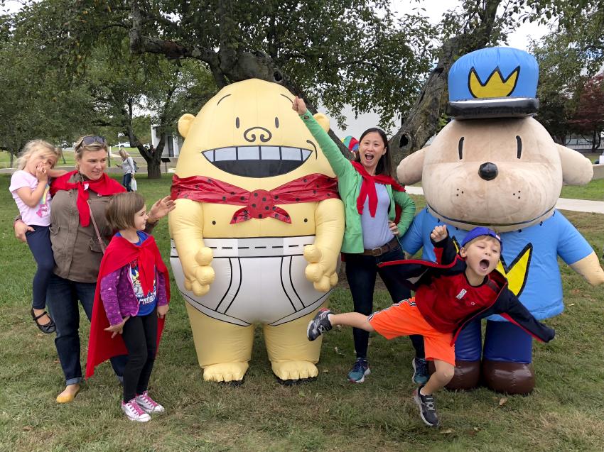 Group photo of visitors with Captain underpants.