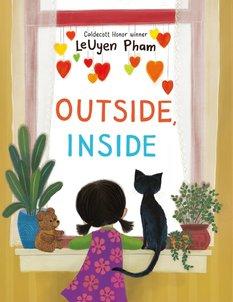 A child looks out a window where hearts are hanging on the glass and plants and a cat sit on the windowsill beside her.