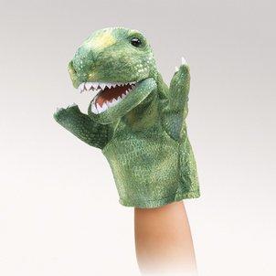 Photograph of a green Tyrannosaurus Rex hand puppet on someone's hand. The puppet's mouth is slightly open and small arm outstretched.