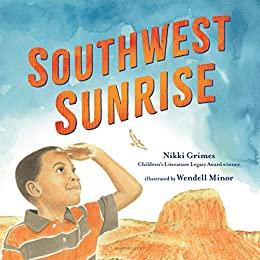 A child shields his eyes from the sun as it looks up in the sky across the desert.