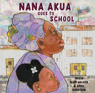 An elderly Black woman in a purple headwrap and tattoos on her cheek stands proudly next to her granddaughter in front of a school.