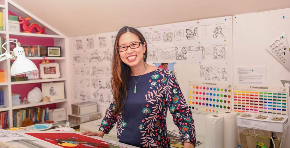 Grace Lin standing in her studio