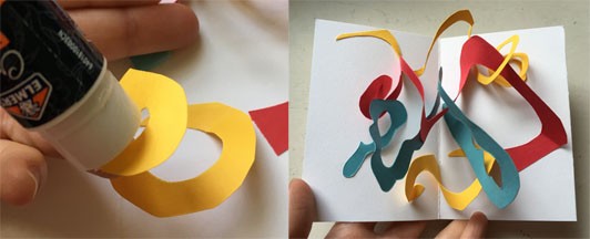 Two images showing spiral pop-ups. The one to the left shows a spiral that has been glued on one side to the card, and glue is being applied to the opposite end of the spiral that is facing up. The image to the right shows a blank card filled with red, yellow, and blue spirals that pop-up and entangle when opened.